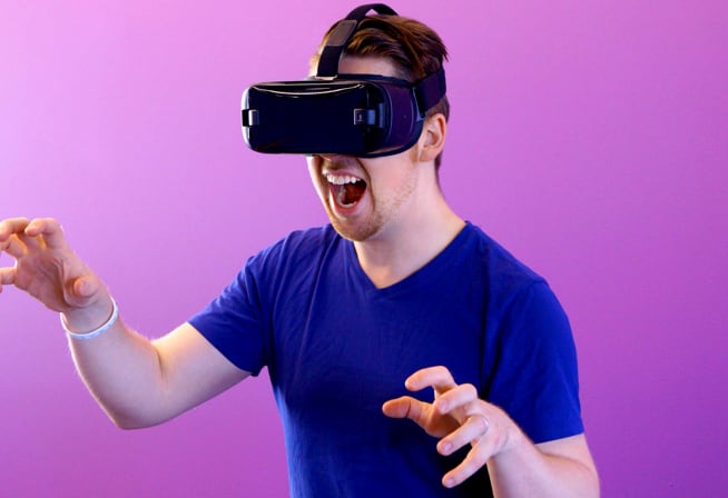 Image of person with VR headset on.